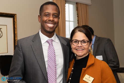 Man and woman at LCCC businessl event